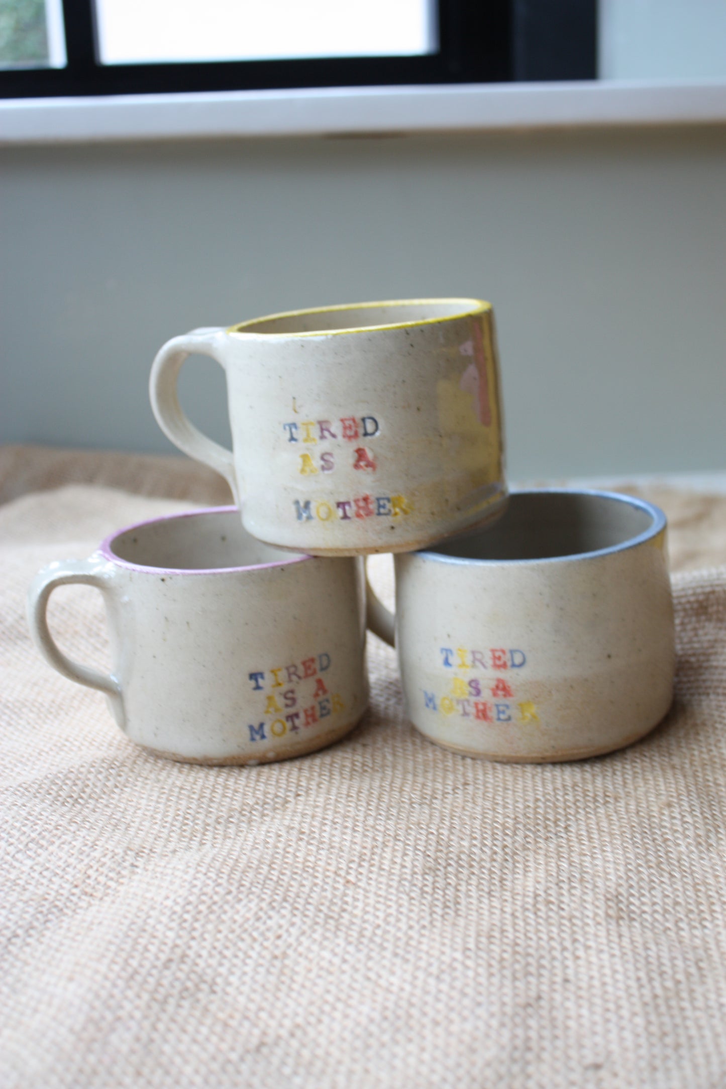 'Tired as a Mother' Mugs